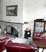 Sitting room at 6 Armstrong Cottages, self-catering cottage in Bamburgh  Village, Northumberland, UK