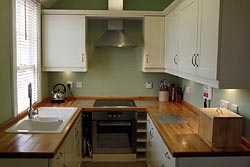 Kitchen at 6 Armstrong Cottages, self-catering cottage in Bamburgh  Village, Northumberland, UK