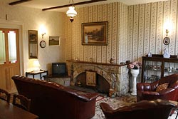 Lounge at 6 Armstrong Cottages, self-catering cottage in Bamburgh  Village, Northumberland, UK