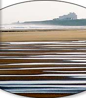 Bamburgh Castle and Bamburgh Beach, Northumberland, UK